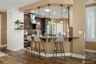 Great bar with beautiful pendant lighting.