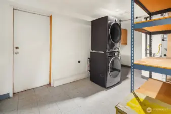 Large laundry room with additional storage