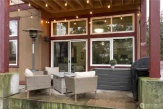 South-facing private patio, steps to a grassy area. BBQs are fine in this area.