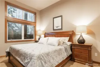 Primary bedroom.  All 11-foot ceilings again shown here.  Upper windows also here are remote controlled.