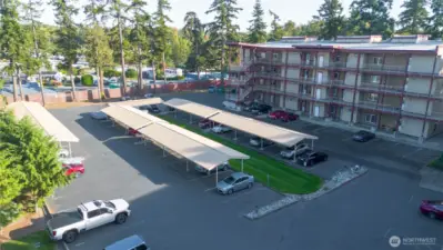 Parking lot in the back.  Also the mailbox cluster in the back under the stairway.