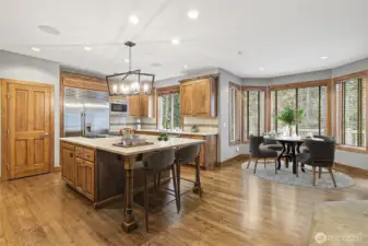 Beautiful hardwood floors and peaceful backyard views.