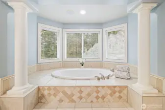 Relax at the end of the day in this grand soaking tub.