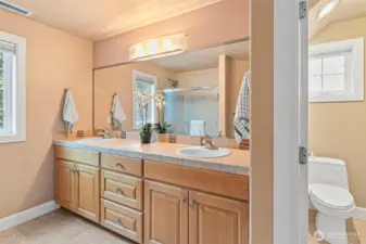 Upstairs hall bath has plenty of storage and counterspace!