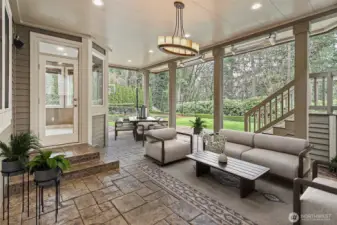 Covered patio with built-in gas heaters can be used year round.