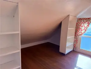 Closets on wheels make this upstairs space versatile!