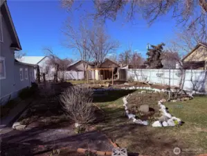 Step Outside to the gorgeous landscaping of this property.