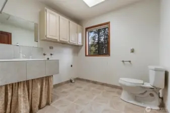 1/2 bath and laundry room on main