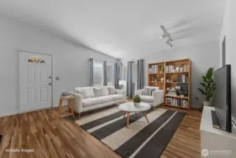 Virtually staged to demonstrate the potential layout and usability of the living space.