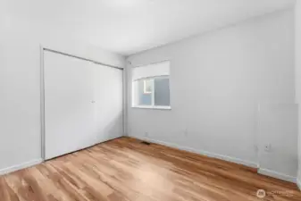 Bedroom shown in its original, unstaged condition.