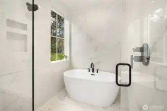 Walk-in shower plus soaking tub in primary!