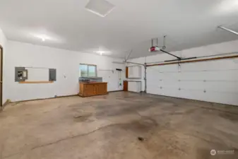 Spotless Double Car Garage with Work Station.