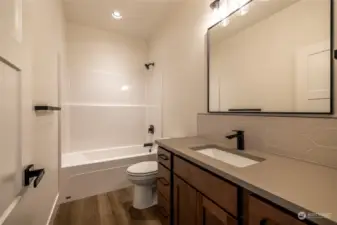 Guest Bathroom - Soft-Close Cabinetry & Quartz Countertops