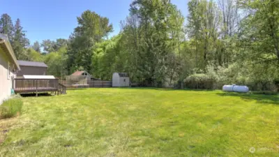 Huge level & fully fenced backyard. Enjoy as is or make it your own!