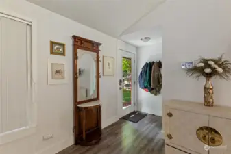 Entrance with additional coat closet.
