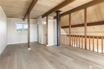 This room held a set of full size bunkbeds, queen size bed, 2 large dressers and a couch with ample room to spare