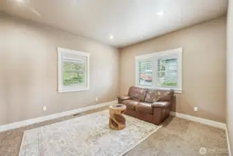 Bonus room on the main floor can be used as a TV room, theatre room, the perfect extra space!