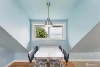 The 579sqft loft apartment above the detached 3-car garage has lots of space, a kitchenette and bathroom.