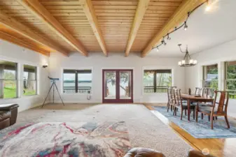 Access to the wraparound deck and yard from the living room.  Watch for whales and eagles!