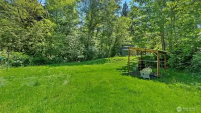The path shown previously leads to this private, sunny backyard.