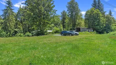 Additional parking up on the easement and a few storage sheds.