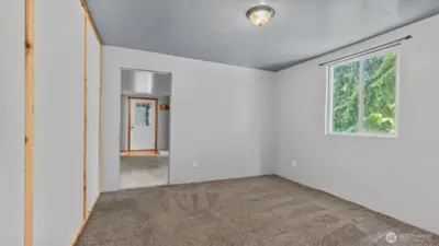 This view from the dining room looks towards the bonus room and front door.