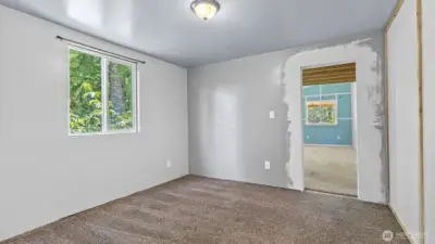 The flex space that has been used as a dining room.