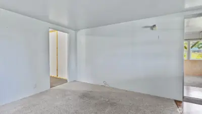 One more look at the bonus room leading to the kitchen.