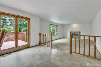 The kitchen flows into the informal areas of the home.