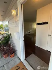 The new flooring gains attention upon entering into the living space