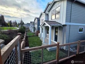 Fully fenced yard with gate & a walking path to community open space.