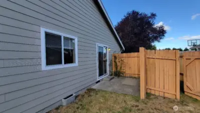 Private patio & slider off the front room
