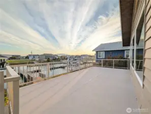 Spacious deck is great place to watch the many stunning sunrises and sunsets.