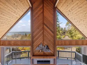 View from top of stairs  of primary bedroom