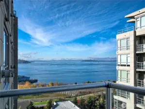 Your front yard is the Puget Sound; step onto your private deck where the salt air meets an infinite horizon, claiming the water as your permanent backdrop.