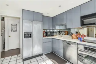 Stainless appliances. Pantry has stacked W/D and professionally shelved