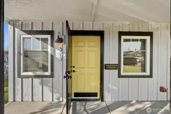 Locking metal screen door on the front.