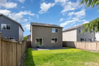 Step outside to a spacious backyard—perfect for relaxing, entertaining, or gardening. A built-in sprinkler system makes yard maintenance a breeze.