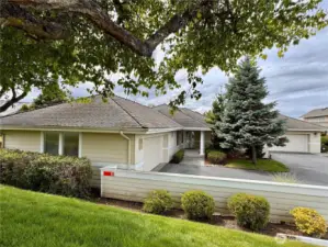 Driveway, 2 car garage.