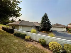 2 car garage with shop space. Only 1 step into the house.