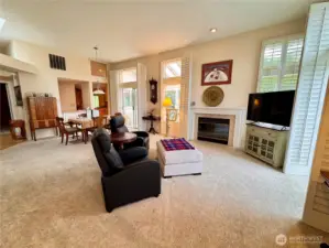 Full length shutters for the living room windows. Gas fireplace.