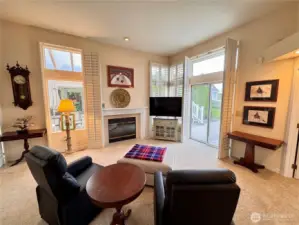 Sliding door to the deck to enjoy the views and summer entertaining.