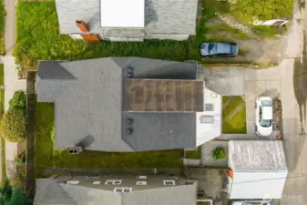 detached garage, and partially fenced yard