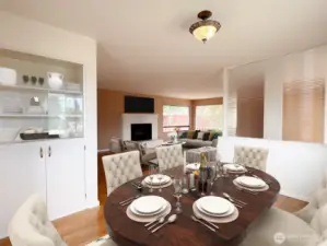 Dining room has a charming built-in cabinet