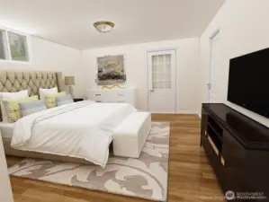 Downstairs bonus room has its own entrance.  This photo is virtually remodeled to show you it as a bedroom.