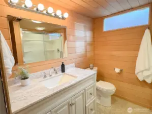 A second warm, beautiful bathroom awaits you on the lower level