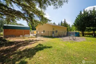 Over 9,200 sqft of usable space with the main home and buildings. Perfect for home businesses even if you don't have dogs.