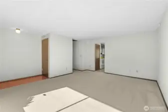 Living room doorway leads to kitchen