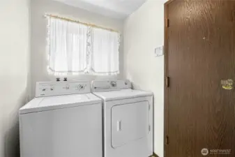 Laundry room leads to 2 car attached garage