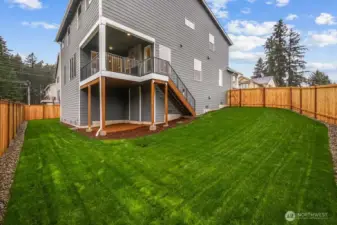 Large landscaped and fenced yard